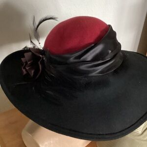 Chic Women's Black and Red Hat with Feather Accent